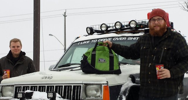 First place Max King pictured with his buddy, his Jeep and Off Road Addiction bag containing a whack of prizes. .jpeg