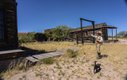 This vacant lot was used in the Shootout at the OK Corral [Tombstone movie].  Guide Frank Brown and his cat Sam point out how the shootout took only 30 seconds.