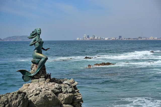 Striking statues have the perfect backdrop in Olas Altas photo Perry and Cindy Mack.JPG