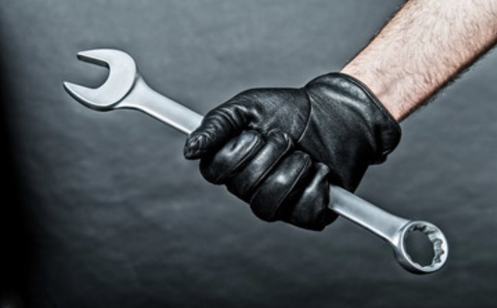 gloved-hand-with-wrench.jpg